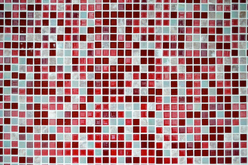 Fototapeta premium Ceramic mosaic tiles in red tones.