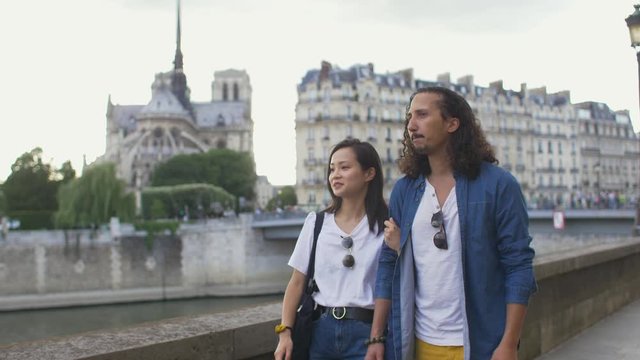 Couple in love walking in Paris, France
