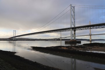Road Bridges spanning the Firth of Forth on overcast day