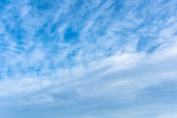 Blue sky with cloud background.