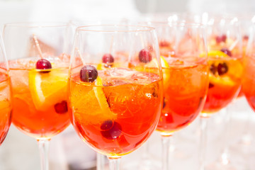 Stylish alcoholic aperol spritz trendy cocktail with orange slice