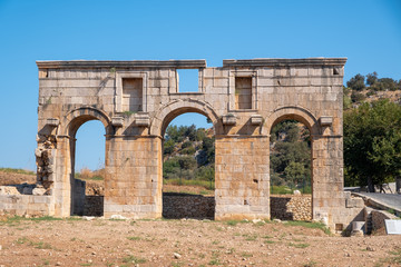 Fototapeta na wymiar Arch of Mettius Modestus in ancient Lycian city Patara. Antalya Province. Turkey
