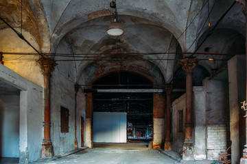 Old abandoned building with vaulted celling in Gothic style