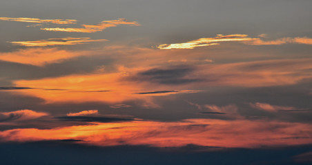 Dramatic sky, Clouds with sunset light effect on
