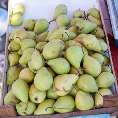 Pear on the counter for sale.