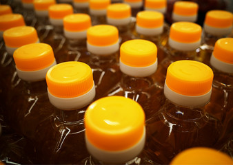 Multiple bottles with olive oil food background