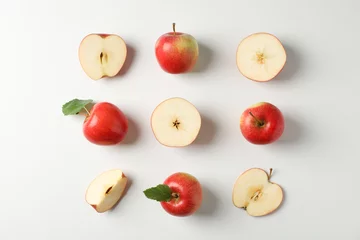 Fotobehang Flat lay with red apples on white background, space for text © Atlas