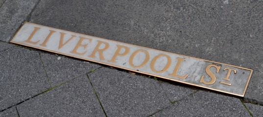 Brass street marker on the sidewalk pavement in Hobart Tasmania that says Liverpool Street