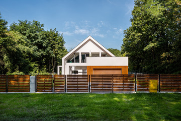 Modern house surrounded by green