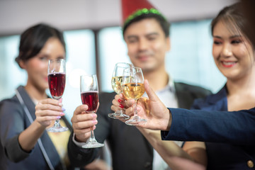 Business people drink wine At a party celebrating business success