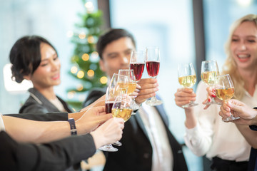Business people drink wine At a party celebrating business success
