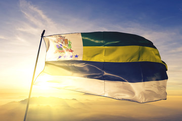 Itapetininga of Brazil flag waving on the top sunrise mist fog