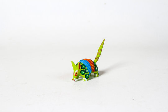 Mexican green alebrije from oaxaca isolated on white background.  Shot from above