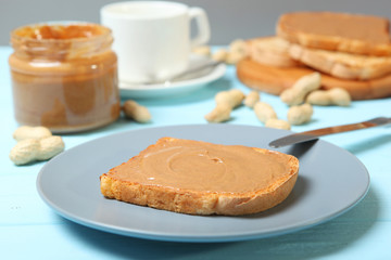 Fototapeta na wymiar toast with peanut butter on the table.