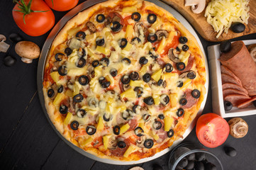 Background from Italian pizza, and ingredients. Pizzeria, restaurant, recipe book, home cooking