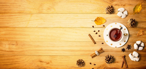 Autumn theme with cinnamon tea - flat lay
