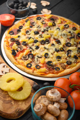 Italian pizza, with ingredients. Cookbook, homemade recipes, restaurant business. Vertical frame