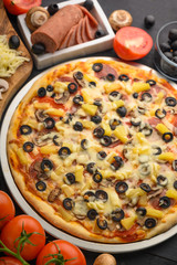 Italian pizza, with ingredients. Cookbook, homemade recipes, restaurant business. Vertical frame