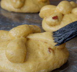 processing of puff pastry, pan de muerto, prepared in Mexico during the November celebration