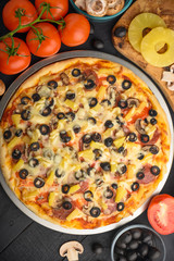 Italian pizza, with ingredients. Cookbook, homemade recipes, restaurant business. Vertical frame