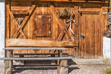 old abandoned wooden house in the dolomite alps, south tyrol