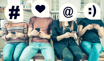 Group of friends using smartphones to communicate in social media. Concept of a generation of millennials who are online all the time. Warm hipster filter. - obrazy, fototapety, plakaty