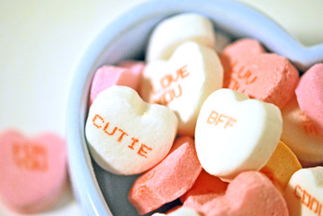Heart shaped candy in a heart shaped china box.