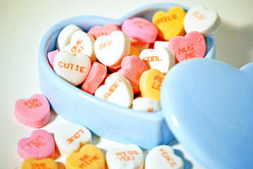 Heart shaped candy in a heart shaped china box.