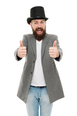 Thumbs up to retro. Bearded man wearing cylinder hat in retro style. Caucasian guy showing thumbs ups in retro tophat. Emotional hipster with mustache and beard in retro hat