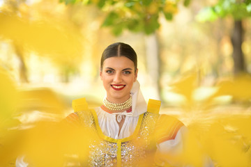 Young beautiful slovak woman in traditional costume
