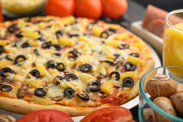 Background from Italian pizza, and ingredients. Pizzeria, restaurant, recipe book, home cooking