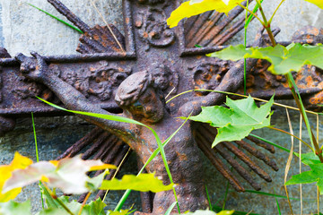 Colorful Jesus in autumn Nature from the old village Cemetery, Czech Republic