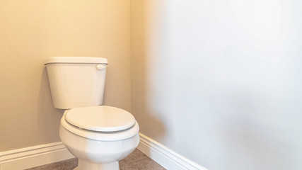 Fototapeta na wymiar Panorama frame A white toilet and cubicle in a modern household