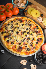 Italian pizza, with ingredients. Cookbook, homemade recipes, restaurant business. Vertical frame