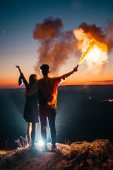 Obraz premium couple and smoke grenade