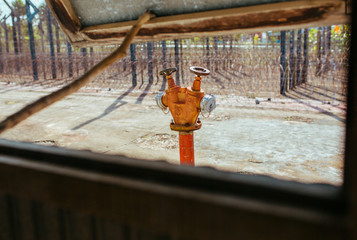 Old red Fire Hydrant on the street in Vietnam
