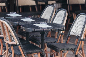 Cozy Paris cafe tables and chairs.