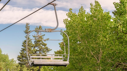 Panorama Empty chairlifts in Park City Utah ski resort on a sunny summer day