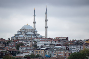Fototapeta na wymiar Suleymaniye Mosque close-up. The city and slums at the bottom.