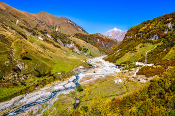 Fototapeta premium Mountain river in a gorge in Georgia