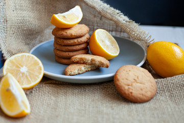 lemon cookies made at home, citrus baking deliciously lies on a table in a fabric, a recipe for fruit baking