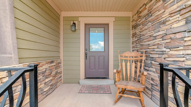 Panorama frame Front porch of modern house with rocking chair