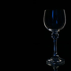 Wine in beautiful vintage crystal glasses on black wall background, with copy space. Wine list, bar drink menu, wine boutique or degustation, square crop concept