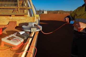 Industry electrician conducting  inspecting testing power plug ensure is safe and up to date prior...