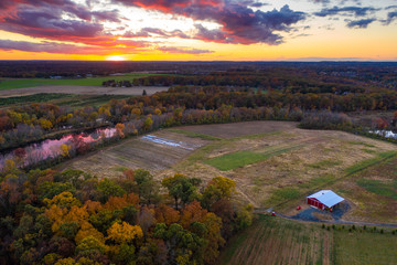 Aerial of Sunset with Fall Foliage