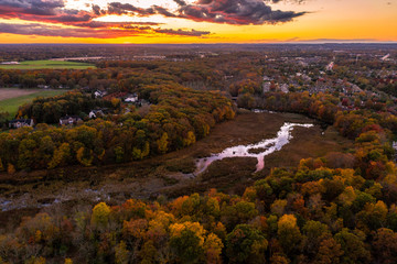 Aerial of Sunset with Fall Foliage