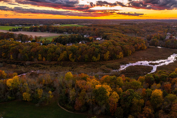 Aerial of Sunset with Fall Foliage