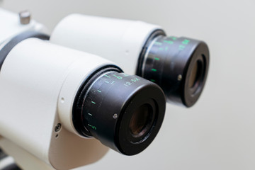 mircoscope oculars close up on solid white background