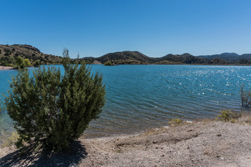 Fototapeta na wymiar Bill Evans Lake shoreline in New Mexico near Silver City.