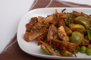 Stir fried crispy fork with red curry.